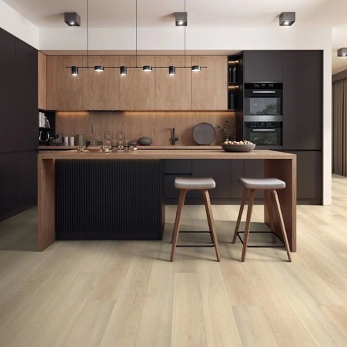 Wood look flooring in a modern Vegas kitchen with dark accents